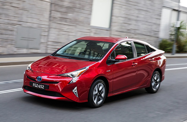 A red Toyota Prius