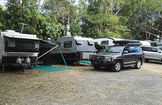 Caravans and vehicles in a caravan park