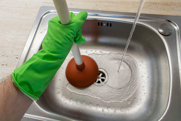 How to handle a clogged drain in your home