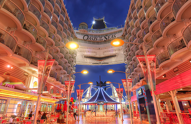 A brightly lit atrium area inside the cruise ship Oasis of the Seas