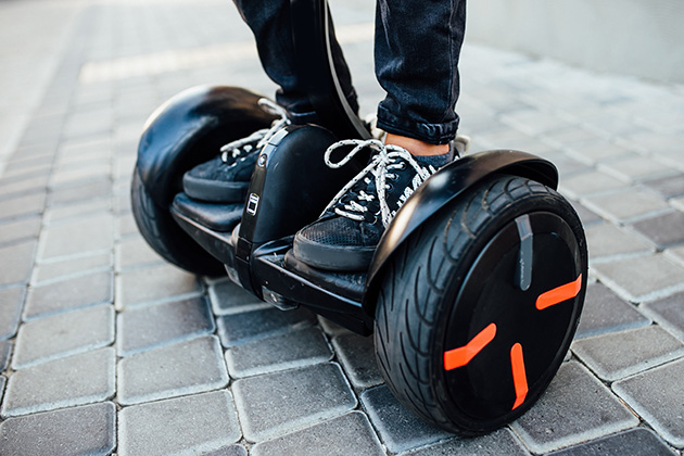 Person riding an electric hoverboard