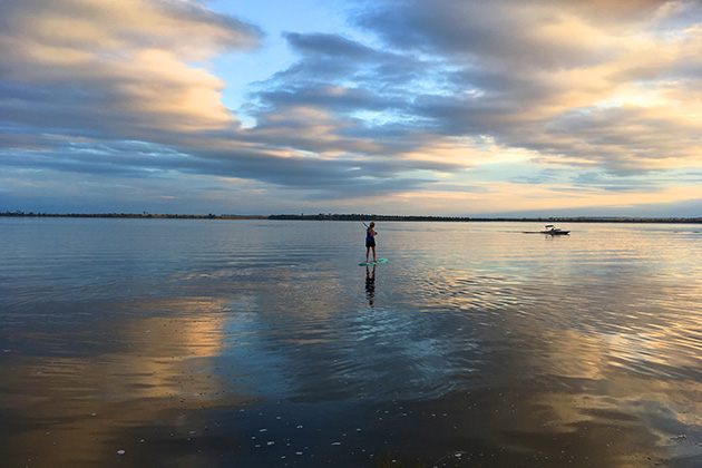 Person paddling on a lake