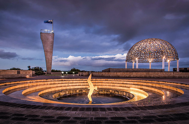 Memorial sculpture at night