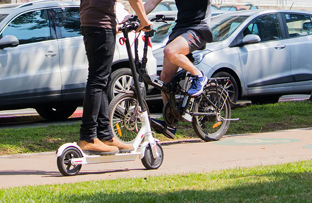 E-scooter and bike on a path