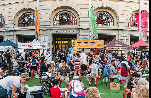 A crowd of people at the Twilight Hawkers Market in the Perth CBD
