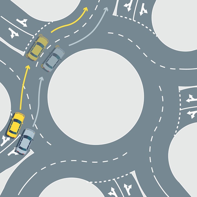 Roundabout with two cars on it