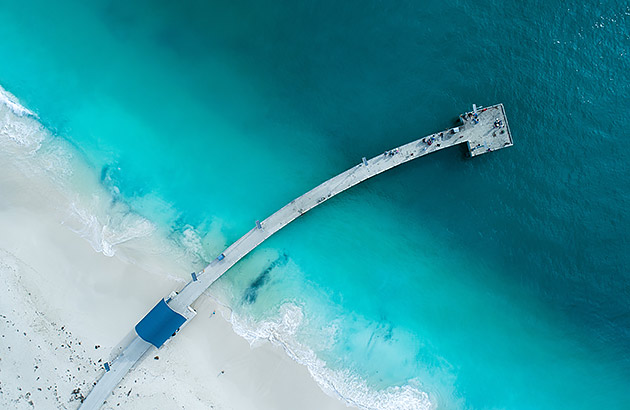An aerial photo of the curved Jurien Bay jetty