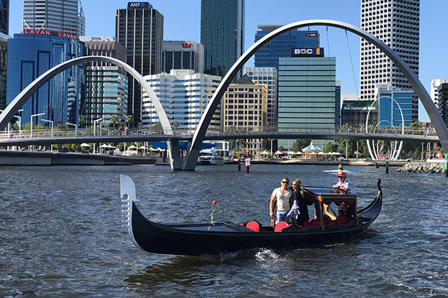 Two people in a gondola boat