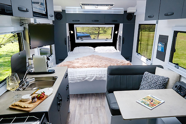 Mountain Trail caravan interior showing the lounge and kitchen area