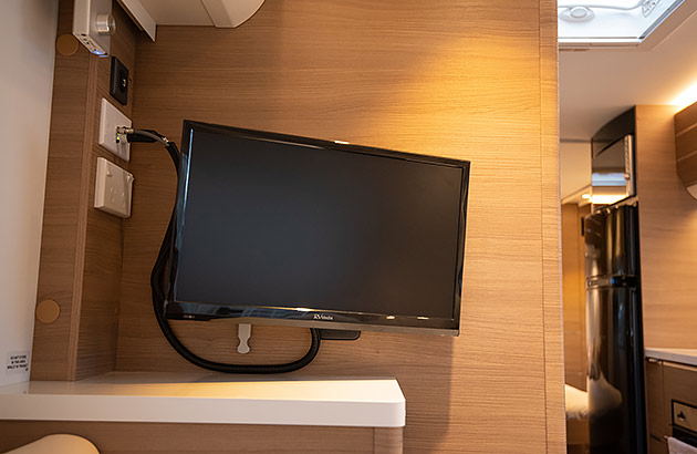 A TV mounted in a caravan