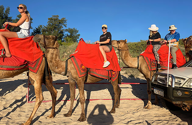 Riding camels on Cable Beach in Broome