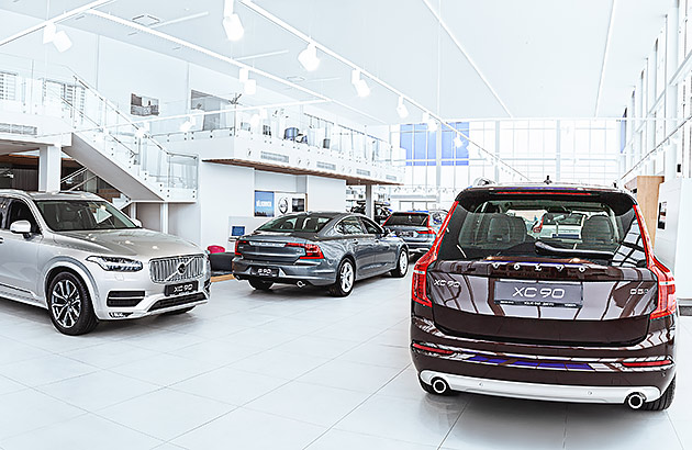 Cars on the floor of a Volvo showroom