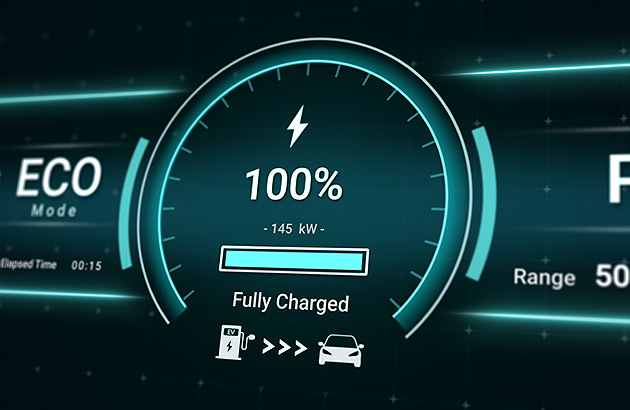 An electric car dashboard showing a full charge