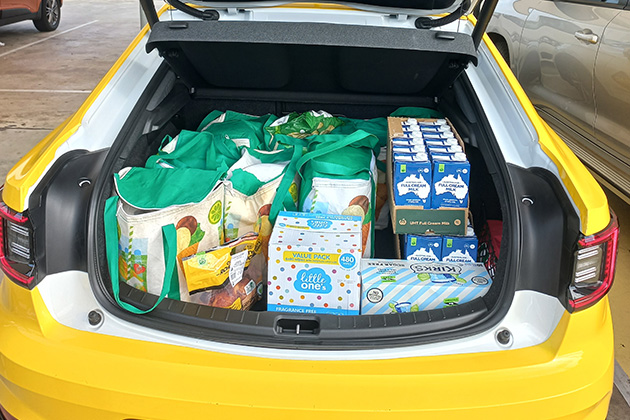 The boot of a Polestar 2 with shopping