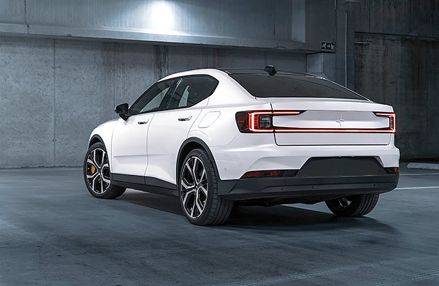 A white Polestar 2 in an underground carpark