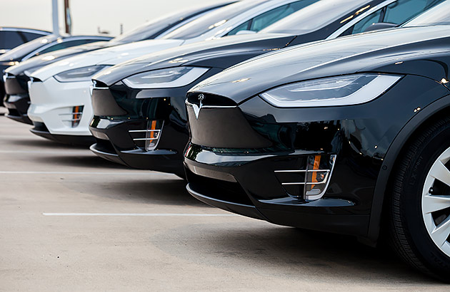A row of Teslas for sale