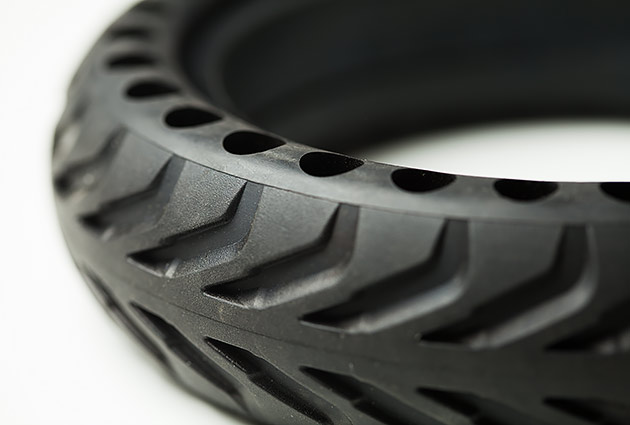 A black honeycomb e-scooter tyre