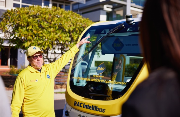 RAC staff showing passengers RAC Intellibus