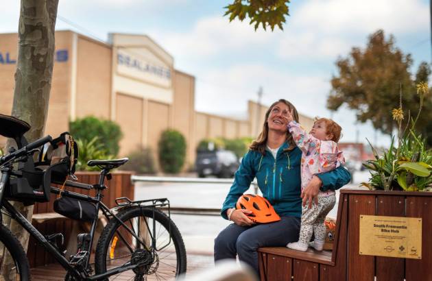 A mum and her young child relaxing at the South Freo Bike Hub.