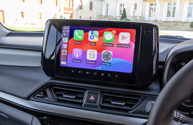 Apple CarPlay operating on the screen of a 2024 Suzuki Swift