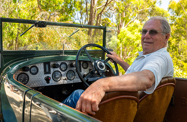 Jim Runciman sitting in his 1930 Bentley Speed Six