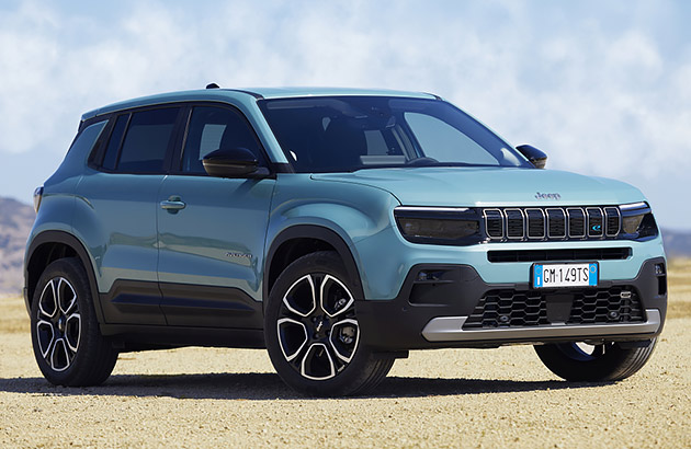 A blue Jeep Avenger parked on a gravel road