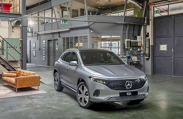 A grey Mercedes Benz EQA in a warehouse setting