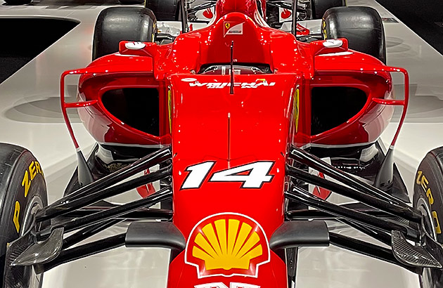 A close up of the body of a red Formula 1 car 