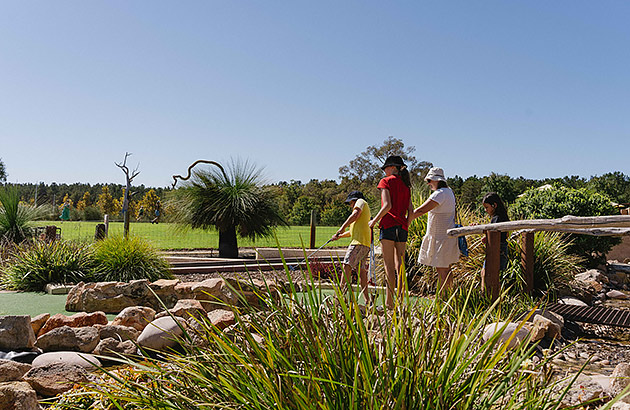 Children playing on the mini golf course at Old Coast Road Brewery