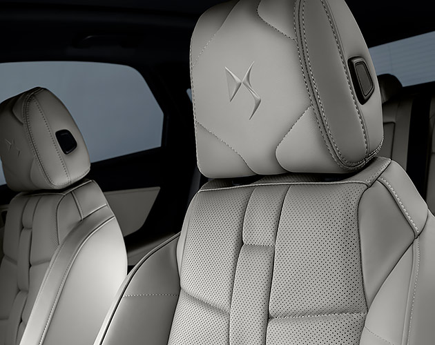 The air-conditioned white leather seats of a DS7 vehicle