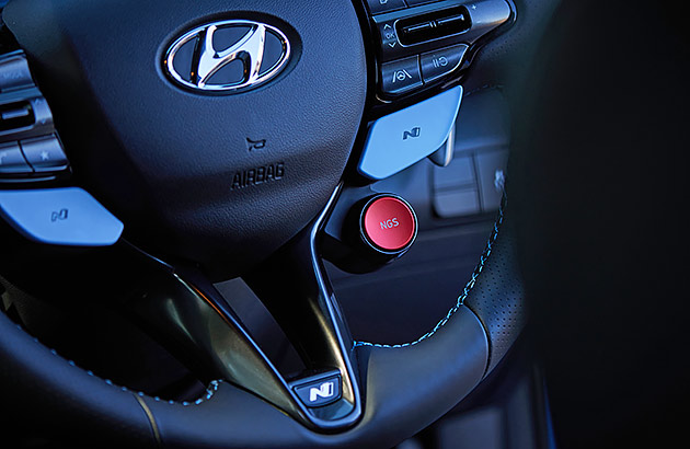 A close up of the NGS button in a Hyundai i30