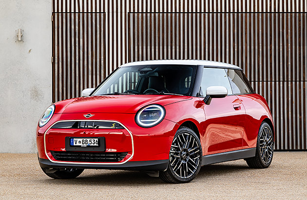 A red Mini Cooper E