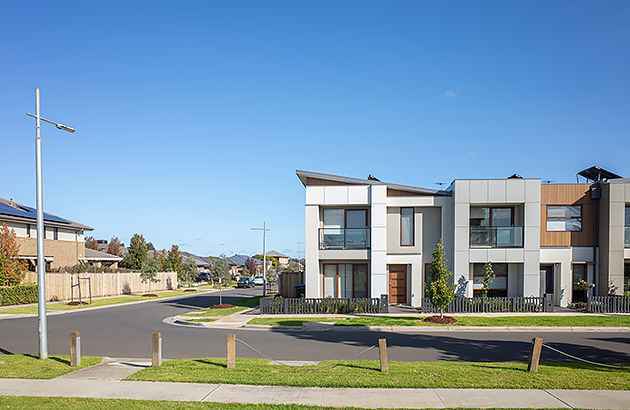 A suburban street corner showing the intersection