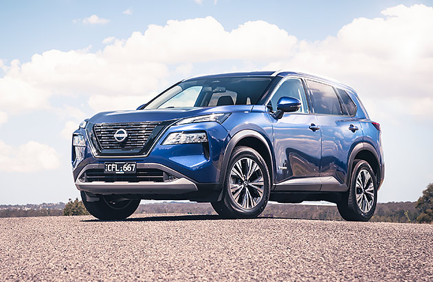 A blue Nissan X-Trail ePower parked on a tarmac