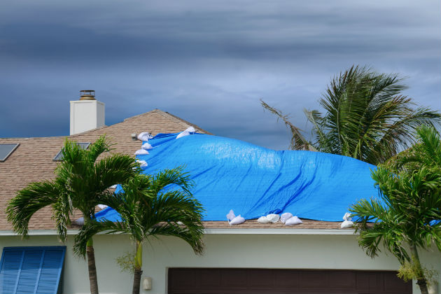 Storm damage to the roof of a house