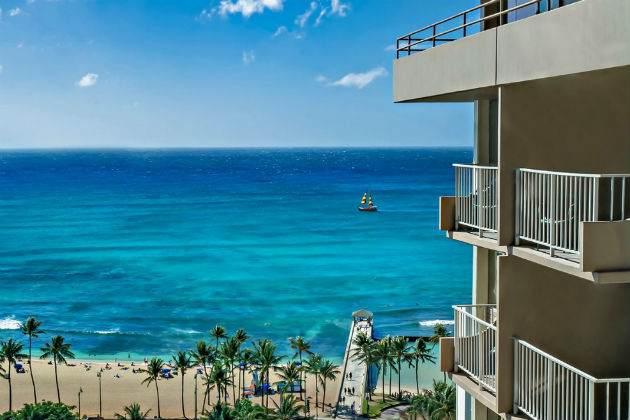 A view of the Queen Kapiolani hotel and beaches behind
