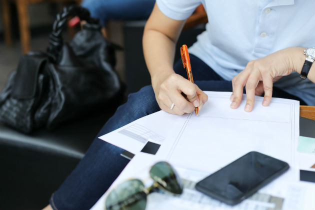 Traveller sorting out paperwork