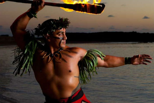 A dancer performing a traditional luau
