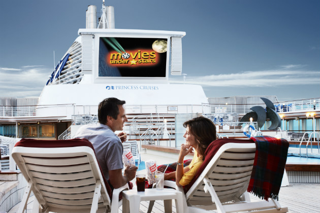 Couple about to watch a movie on a cruise ship deck