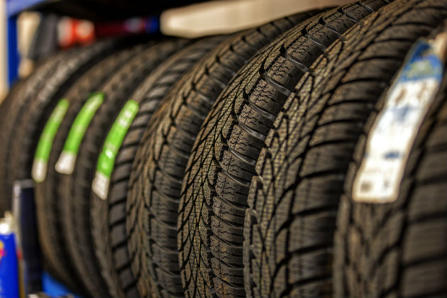 Tyres in a warehouse with different tread patterns