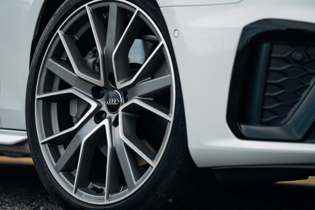 Wheel and rim of white Audi A4 Advant