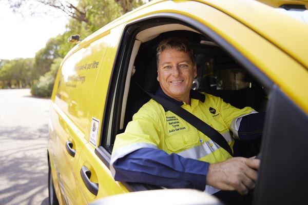 An RAC Roadside Assistance mechanic seated in the patrol van