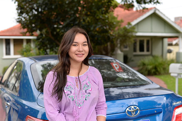 Young driver Kelli Kang with her new car