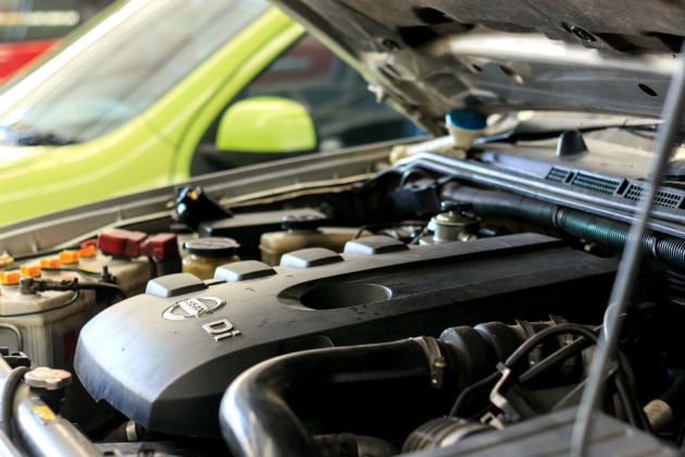 Looking under a car bonnet