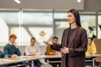 Young adult speaking in front of audience