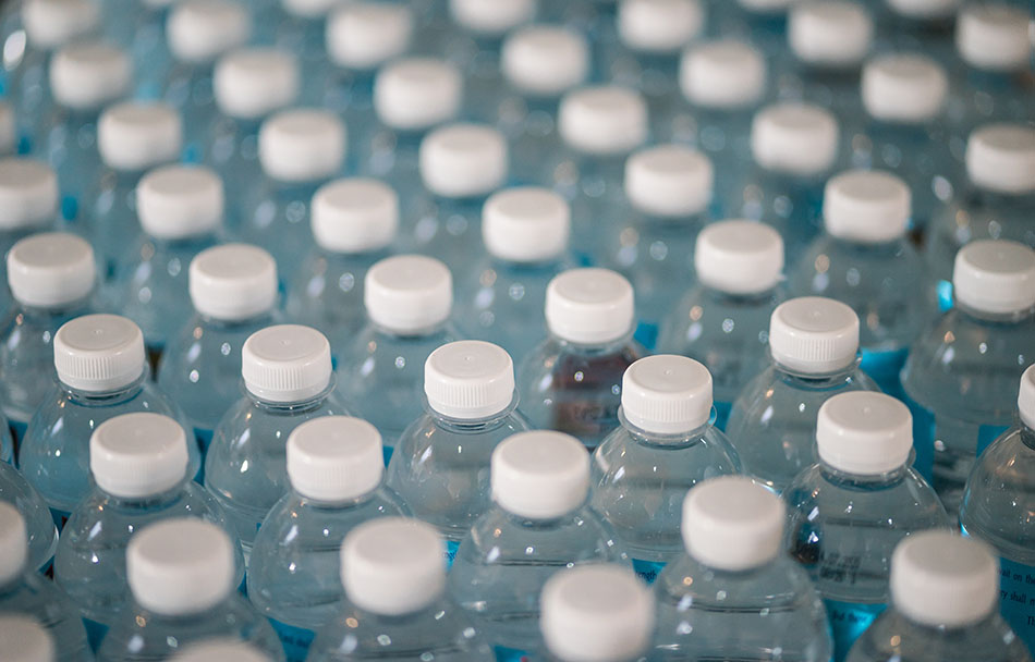 An arial photo of many bottles of water stacked together
