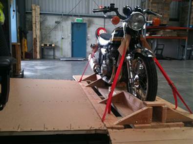 a motorbike in a box pre-flight