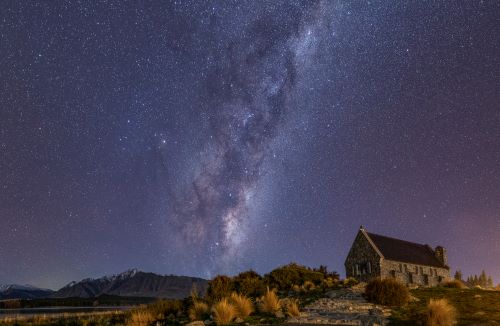 The Church of the Good Shepherd Pano standing on a small hill in front of a grand night sky full of stars and the milky way