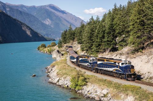 The Rocky Mountaineer making its way through the Canadian mountain landscape 