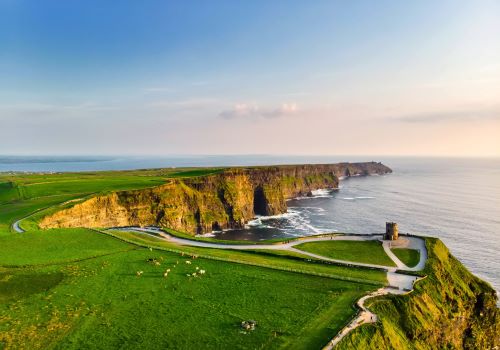 Green Cliffs of Moher in Ireland at sunset